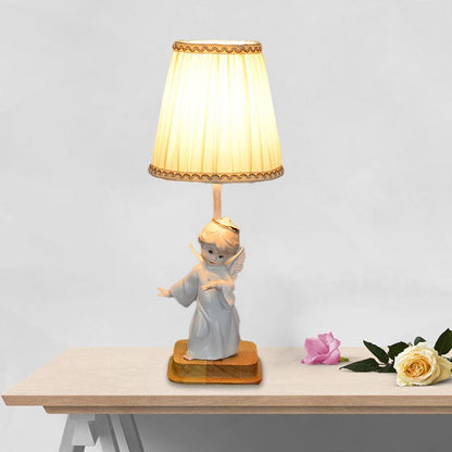 Elegante Nachttischlampe Engel
