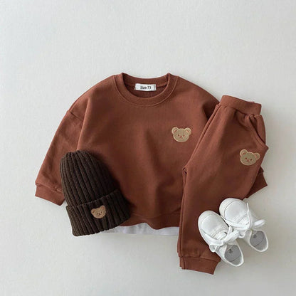 Ensemble bébé en coton doux avec pantalon et bonnet assorti