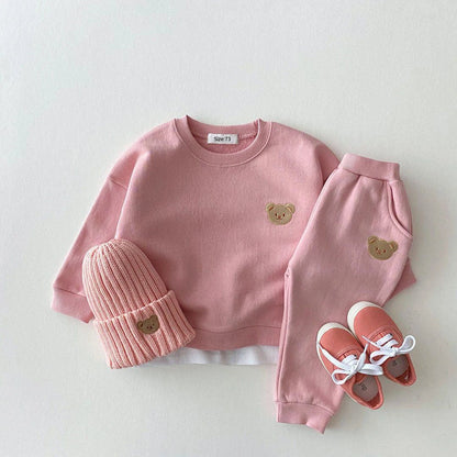 Ensemble bébé en coton doux avec pantalon et bonnet assorti