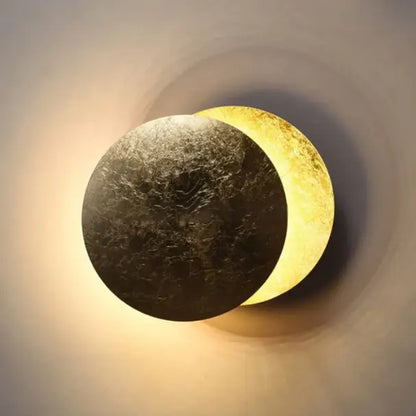 Design-Wandleuchte in eleganter Eclipse-Form
